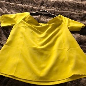 Bright yellow blouse!